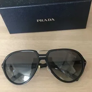 Prada | Accessories | Prada Sunglasses | Poshmark display picture 1